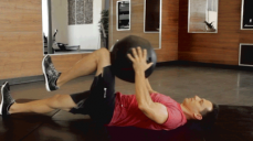 Double Knee Strike exercise with a Dynamax medicine ball helps to train your coordination, endurance, and agility. Try this exercise for your next functional training session.